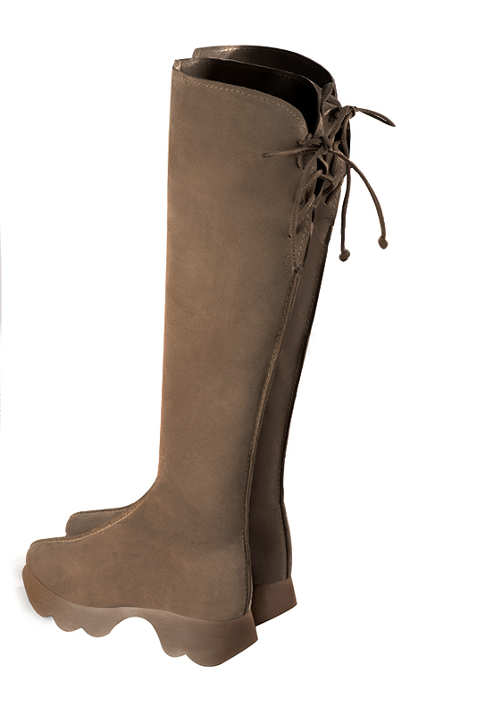 Chocolate brown women's knee-high boots, with laces at the back. Round toe. Low rubber soles. Made to measure. Rear view - Florence KOOIJMAN